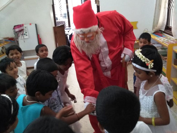 The children were told about the birth of Lord Jesus and the legend of Santa Claus. The spirit of giving and sharing was inculcated among the tiny tots as they exchanged exquisitely packed gifts with each other and played games. |Christmas celebrations - Thudiyalur